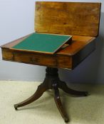 A George III mahogany pedestal library table The folding hinged top enclosing a fitted interior