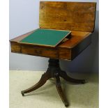 A George III mahogany pedestal library table The folding hinged top enclosing a fitted interior