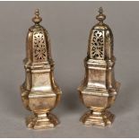 A pair of George V silver pepperettes, bearing Britannia Standard hallmarks probably for 1924,