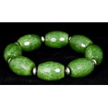 A jade bracelet Each bead facet cut. Approximately 20 cm long.