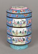 A Chinese Canton enamel stacking box and cover Comprising three sections decorated with figural