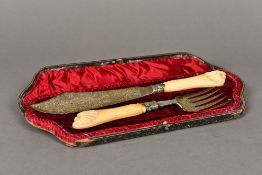 A cased pair of Victorian ivory handled silver fish servers, hallmarked Sheffield 1895,