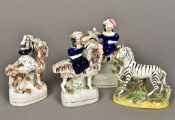 Four Staffordshire pottery groups Three modelled as female figures riding a goat; the other a zebra.