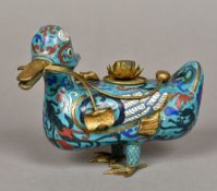 A Chinese cloisonne censor Modelled as a duck holding a lily in its beak. 20 cm long.