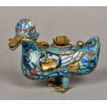 A Chinese cloisonne censor Modelled as a duck holding a lily in its beak. 20 cm long.