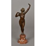 A bronze female nude Modelled stretching, standing on a carved hardstone plinth.