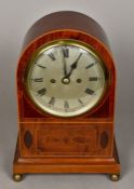 An Edwardian line inlaid mahogany mantel clock The silvered dial inscribed 142-Jays-144 Oxford St,