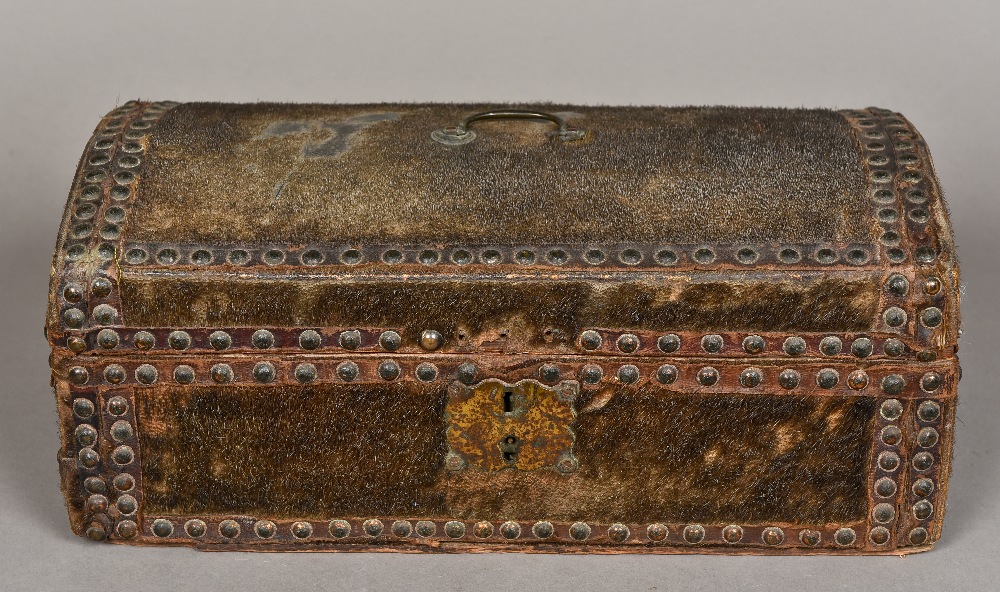 An 18th/19th century donkey hide covered trunk Of small proportions,