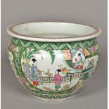 A Chinese porcelain famille rose jardiniere Decorated in the round with figural and scenic