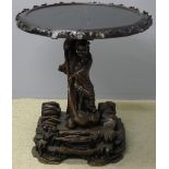 A 19th century Chinese marble topped carved hardwood centre table The black circular removable