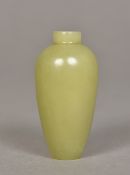 A 19th century Chinese carved celadon jade snuff bottle Of vase form. 6 cm high.