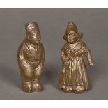 A pair of Dutch silver plated pepperettes One formed as a Dutch girl, the other a Dutch boy.