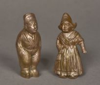 A pair of Dutch silver plated pepperettes One formed as a Dutch girl, the other a Dutch boy.