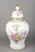 A 19th century German porcelain baluster vase and cover by Carl Thieme of Potschappel Typically