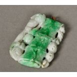 A Chinese carved jade pendant Formed as a bamboo stem. 6.5 cm high.