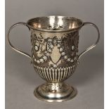 A George III silver twin handled cup, hallmarked London 1779,