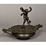 A 19th century Grand Tour bronze inkwell Surmounted with a dancing figure above four lidded wells