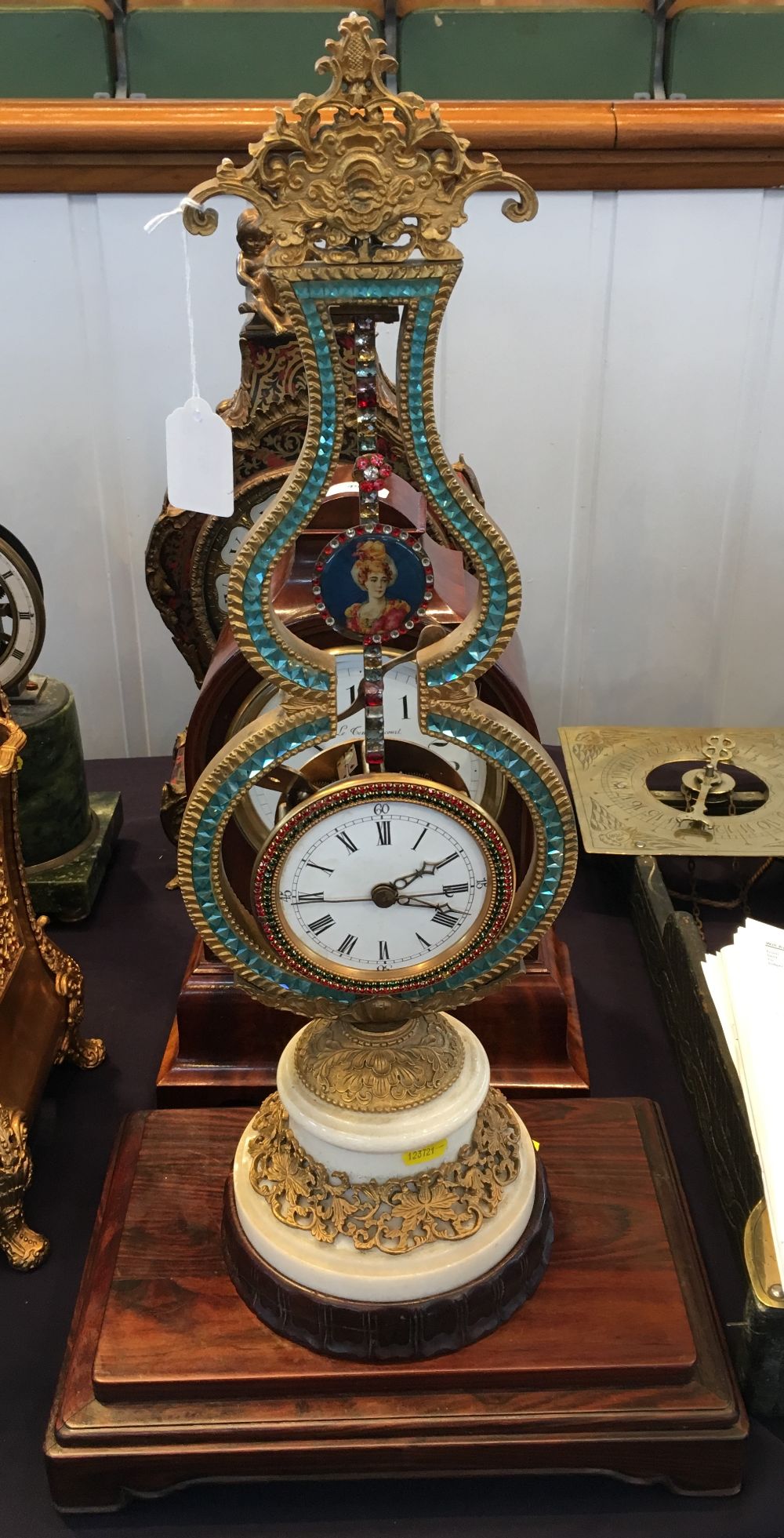 A Chinese gilt metal and coloured paste set mystery clock The 4 inch white painted dial with Roman - Bild 2 aus 11