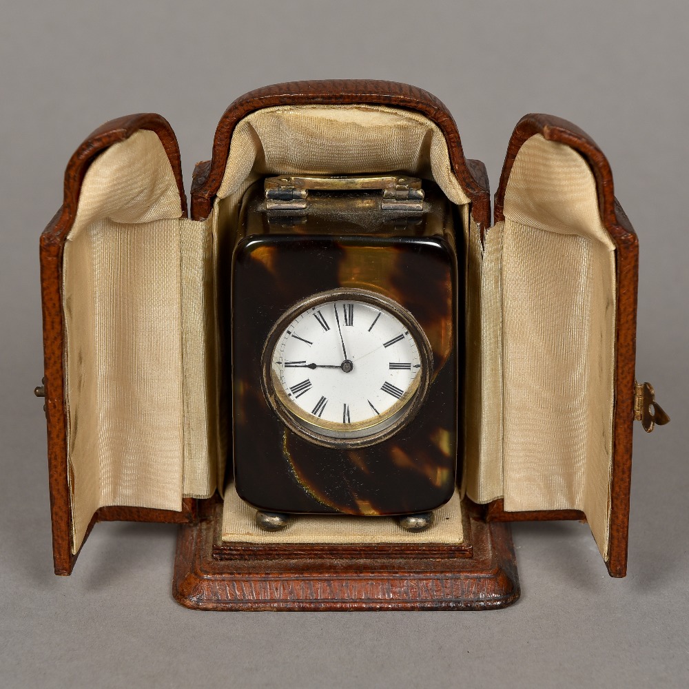 A George V silver mounted tortoiseshell cased carriage timepiece, hallmarked London 1915,