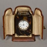 A George V silver mounted tortoiseshell cased carriage timepiece, hallmarked London 1915,
