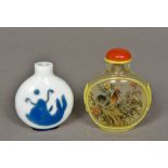 A Chinese Peking cameo glass snuff bottle Decorated to each side with a fish,