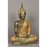 An Eastern cast bronze seated Buddha Worked in Bhumisparsa. 75 cm high.