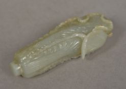 A Chinese carved white and russet jade cabbage pendant 9 cm long.