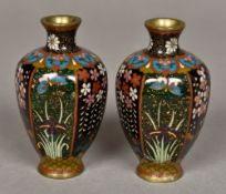 A pair of small cloisonne vases Each of hexagonal baluster form, decorated with floral vignettes.