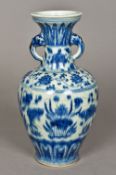A Chinese blue and white porcelain baluster vase Decorated in the round with an aquatic scene. 27.