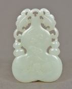 A Chinese carved white jade bat and gourd pendant 5.5 cm long.