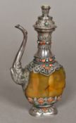 A 19th century Tibetan unmarked silver mounted agate jug With removable lid set with a