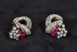 A pair of Art Deco unmarked, probably 18 ct white gold,