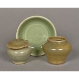 A small Chinese Ming dynasty celadon porcelain dish Decorated with an incised petal flower to the