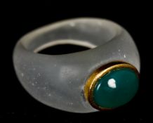 A contemporary jade mounted hardstone ring Together with a lapis mounted example.