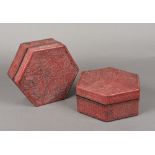 A pair of Chinese cinnabar lacquer boxes and covers Of hexagonal section,