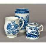 An 18th century Worcester blue and white porcelain baluster mug Decorated with floral sprays,
