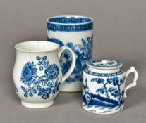 An 18th century Worcester blue and white porcelain baluster mug Decorated with floral sprays,