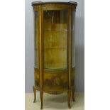 A Vernis Martin style serpentine vitrine The pressed brass three-quarter galleried marble top above