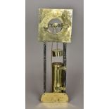 A brass mounted and carved wooden water clock Of typical form with engraved brass dial,