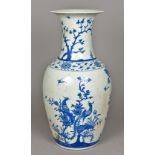 A Chinese blue and white porcelain baluster vase Decorated with exotic birds amongst floral sprays.