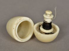 A carved ivory reel box by Pepys & Co, 22 Poultry Worked as an egg. 4 cm high.