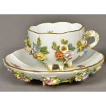 A 19th century Meissen porcelain cup and saucer With floral sprays,