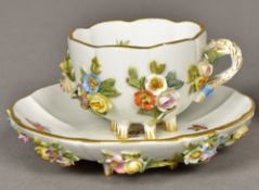 A 19th century Meissen porcelain cup and saucer With floral sprays,