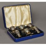 A cased six piece George VI silver condiment set, hallmarked Birmingham 1947,