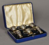 A cased six piece George VI silver condiment set, hallmarked Birmingham 1947,