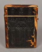 A 19th century crest tortoiseshell card case Decorated with Gothic arched designs. 9.75 cm high.