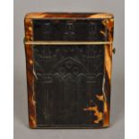 A 19th century crest tortoiseshell card case Decorated with Gothic arched designs. 9.75 cm high.