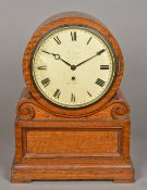 A Victorian oak cased bracket clock The white dial with Roman numerals inscribed Arnold 8? Strand,