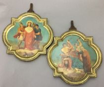 A pair of 19th century painted religious icons Each depicting a Station of the Cross,