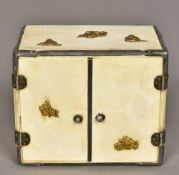 A 19th century Japanese miniature ivory cabinet Mounted with gilded appliques,